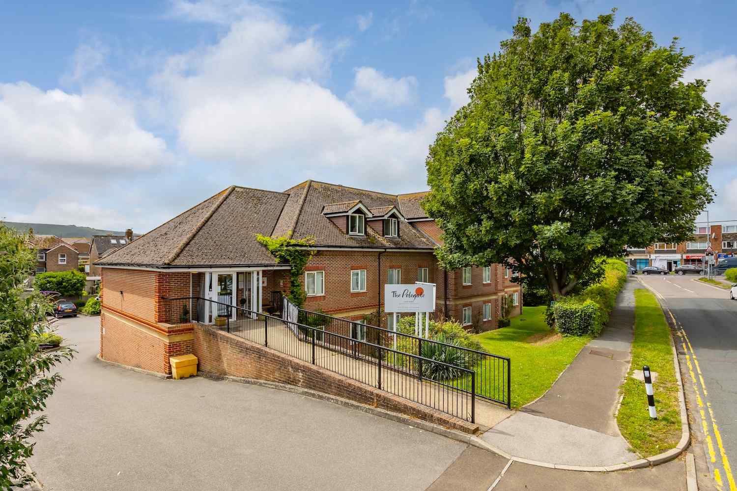 The Polegate care home exterior building and tree
